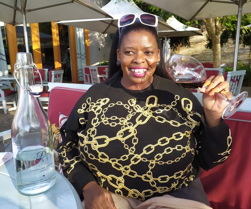 Jabu relaxing and smiling — your personal empathetic listener in Switzerland